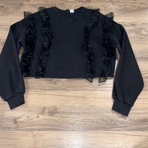 Women’s cropped sweater with ruffles